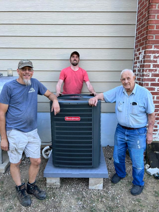 Crew with customer after installation