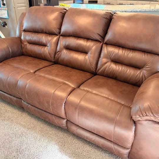 Ashley Furniture Brown Stoneland Manual Reclining Sofa